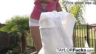 Taylor displays her big tits