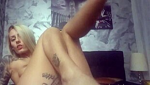 i'm watchin this skinny blonde sexy girl with small tits on webcam doin feet fetish stuff