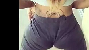 A slutty ebony girl with big booty who is giving intense shaking and booty shaking