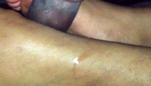 ebony babe gives suggestive footjob to amateur