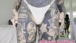 Melody Radford Shows Off Big Tits in Pink Micro Bikini Try-On