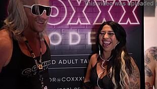 mia mor chats at miami exxxotica 2022 at the coxxx models booth