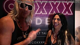 mia mor chats at miami exxxotica 2022 at the coxxx models booth
