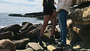 cute blonde gets fucked doggystyle on beach in stockings