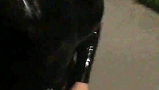 Crossdresser goes for outdoor walk with a sex aid