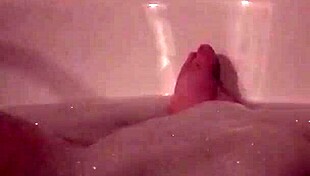 Fatty Strokes Cock in Bubble Bath