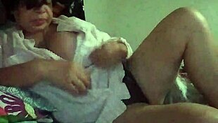 In Bed, Horny Woman Fingers Pussy During Masturbation Session