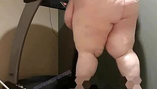 the ssbbw evaporatedmilker works out on the treadmill, showing off her huge belly and big ass
