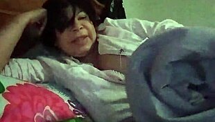 In Bed, Horny Woman Fingers Pussy During Masturbation Session