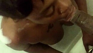 ebony babe gives bathtub blowjob with big cock 😍