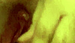 Young woman, aroused uses cucumber for masturbation