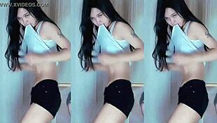 chinese girl dances seductively, showing cute boobs