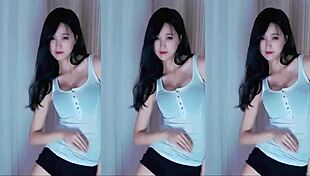 chinese girl dances seductively, showing cute boobs