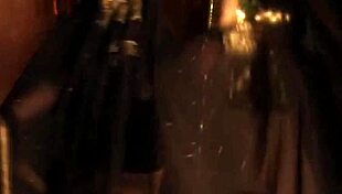 Erotic brunette dancer teases in the night