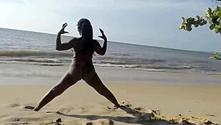 hey, watch this ebony beauty work out naked on the beach!