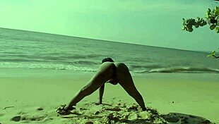 hey, watch this ebony beauty work out naked on the beach!