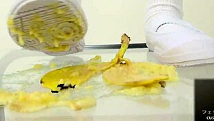 Asian Girl Crushes Banana With Feet