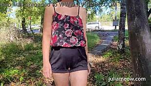 intriguing teen caught in public flashing on the street in front of passers-by.