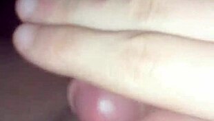 Giving a handjob to a hairy young guy until he cums