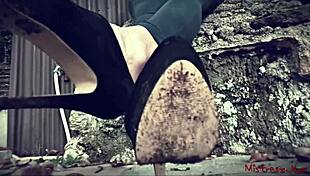 You feel like a dirty worm under the mistress's feet. Shoes and fetish play dominate the scene.