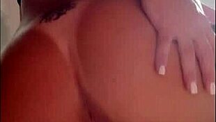 Redhead with big ass masturbates on console, opening her pussy and cumming hard.