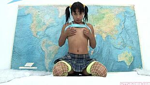 Little Lorie teases her pussy with toys in stockings