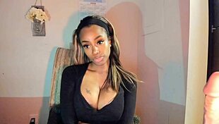 this tattooed ebony milf with big tits is fingering her pussy