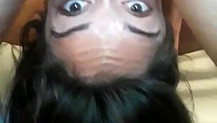 asian woman engages in deep throat activity