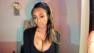 this tattooed ebony milf with big tits is fingering her pussy