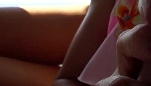 Asian amateurs explore in a car by the ocean.