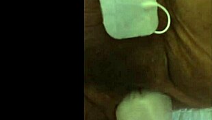 she experiences intense fisting with electrodes in a fetish session