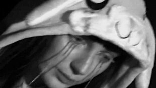 bad boy bunny in halloween costume dancing to music with a playful vibe