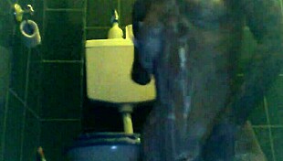 blonde slut with tattoos gets wet and horny in toilet.