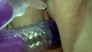 Bbw enjoys wet toy fun with tits and pussy