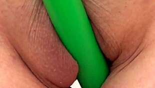 this japanese teen masturbates with a hairless pussy using a toy ring