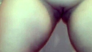 sheila undresses slowly, revealing big tits