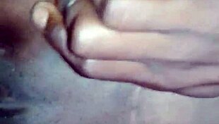 Black Whore Spreads Legs To Show Off Her Tight Pussy In Close Up