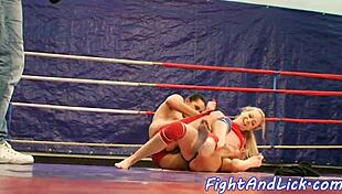 Athletic tattooed babe with small tits engages in muff diving while wrestling in the boxing ring