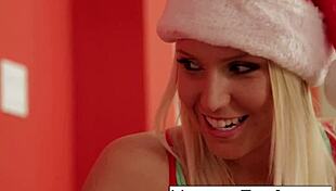 vanessa, the blonde babe, lets santa view her tight wet pussy in the cage.