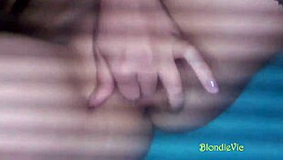 I love fingering my shaved pussy in stockings as an amateur blonde model