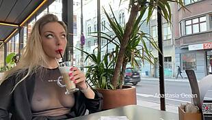 flashing tits in cafe with glass walls so people outside see transparent t-shirt no bra