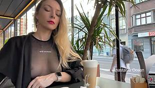 flashing tits in cafe with glass walls so people outside see transparent t-shirt no bra