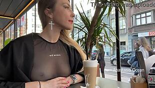 flashing tits in cafe with glass walls so people outside see transparent t-shirt no bra