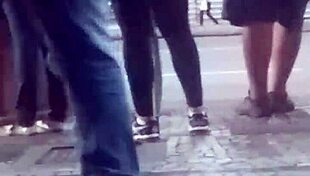 Tasty Brunette with Legs at Bus Stop