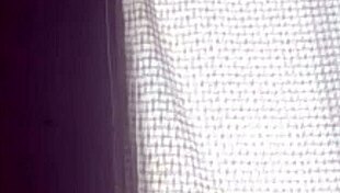 Alice playing with her toy in part two