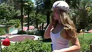 petite teen april teases her pussy outdoors with fingering