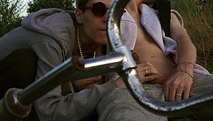 Young Cyclist Receives Handjob During Summer Ride on Bike