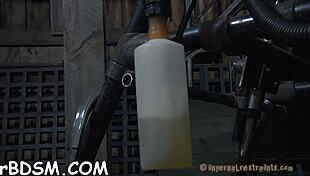 Curvaceous Redhead Maid Plays with Love Beads in a Hardcore BDSM Fetish Scene