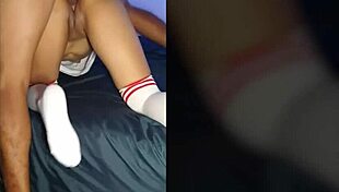 Cogida Usando Un Conjunto Deportivo Japones