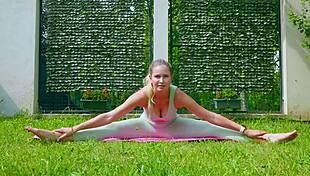 Stella Cardo does sexy outdoor yoga, showing off her big tits and ass